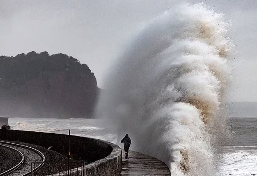Tourist spotted being swept up by heavy waves in a storm while attempting to take a selfie 4