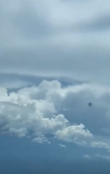 UFO footage: Fly saucer soaring ‘belly-out’ captured by pilot from the cockpit of the plane 1