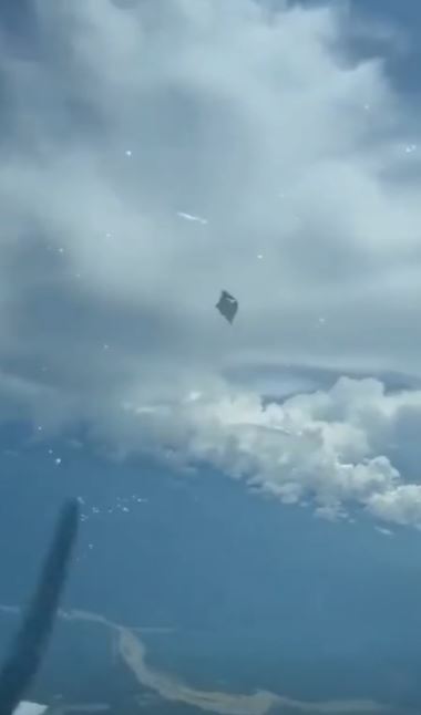 UFO footage: Fly saucer soaring ‘belly-out’ captured by pilot from the cockpit of the plane 3