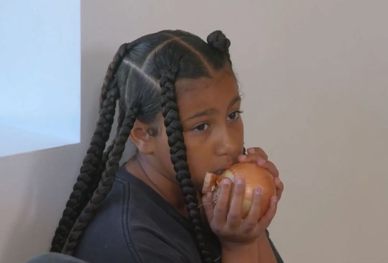 Fans puzzled as Kim Kardashian’s daughter North West eats raw onion like an apple 2