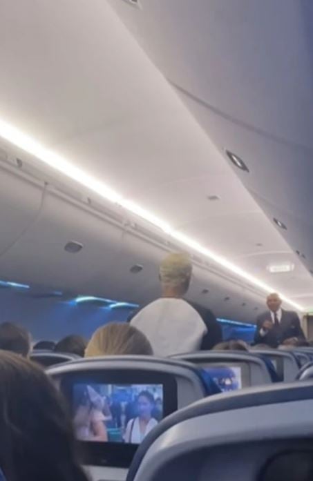 Singer speaks out after nearly getting kicked off flight for trying to sing 1