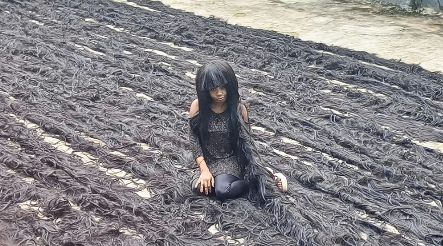 Woman makes record-breaking handmade wig longer than seven Olympic swimming pools 6