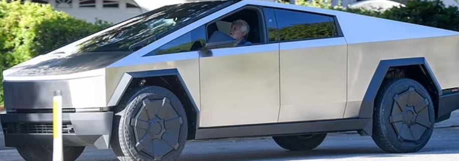 Jay Leno looks tiny as he appears in LA in his MASSIVE Tesla Cybertruck after car fire accident 2