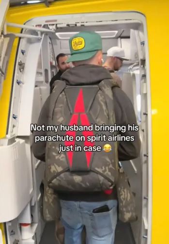 Spirit Airlines passenger sparks debate after wearing PARACHUTE on plane 2