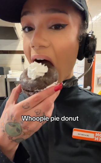 Some viewers were shocked after a Dunkin' employee posted a video showing her eating and drinking everything while working.  Image Credits: @ avanireyes/Tiktok