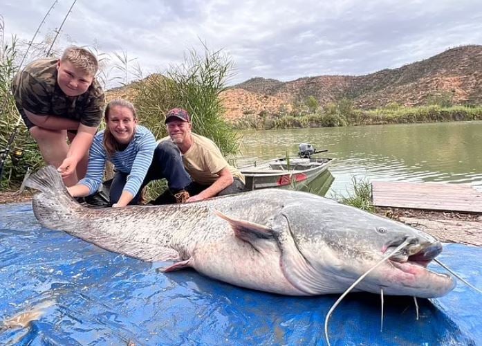 11-year-old boy breaks record after catching mega 152lb catfish during holiday 2