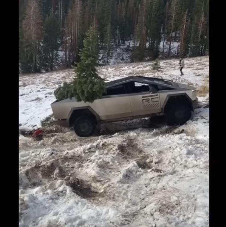 Tesla is getting trolled after Cybertruck pulled to safety after getting stuck on a snowy embankment 1