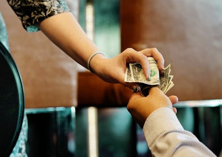 The waitress wants to tip, which is seen as a crucial part of her income. Image Credits: Getty