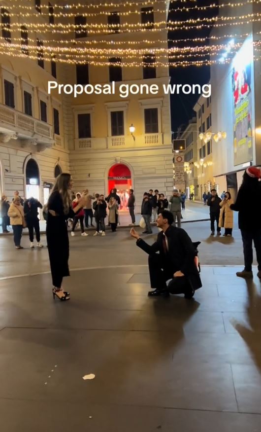 Boyfriend's romantic proposal in front of cheering crowd in Rome goes badly wrong' 1