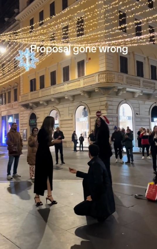 Boyfriend's romantic proposal in front of cheering crowd in Rome goes badly wrong' 2