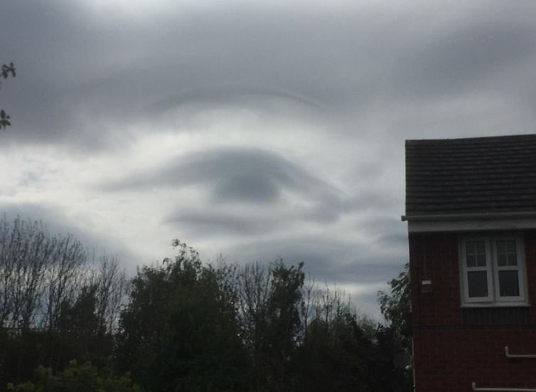 Father stunned after capturing the bizarre moment when a massive eye formed in the clouds 1