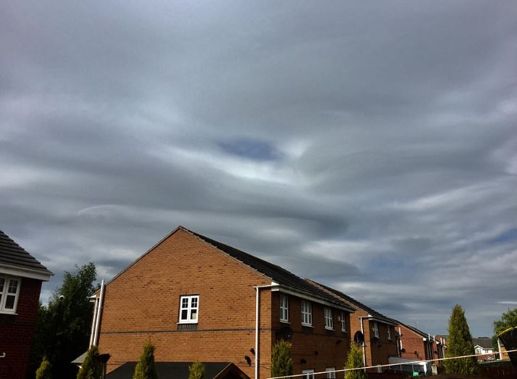 Father stunned after capturing the bizarre moment when a massive eye formed in the clouds 2