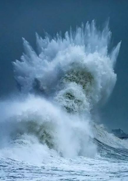 Crashing wave captured to show face of Poseidon, god of the sea 1