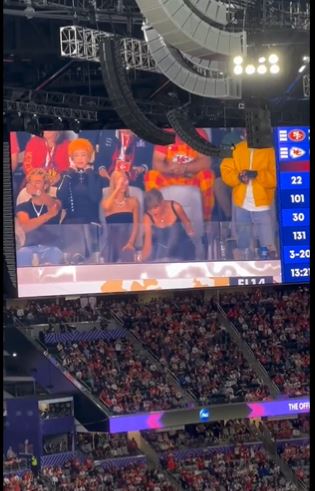 The video of Taylor Swift knocking back a drink on the jumbotron at Super Bowl LVIII went viral on social media. Image Credits: X