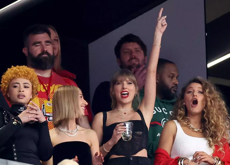 Swift is joined by her pals Ice Spice and Blake Lively at the Chiefs' big game to support her boyfriend. Image Credits: Getty