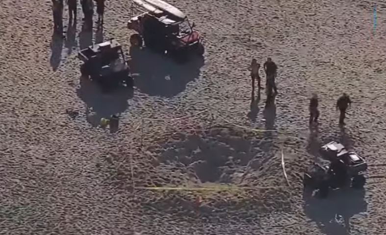 911 call reveals efforts to save girl who died after being buried in sand hole at Florida beach 4
