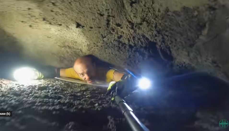 Man films himself getting stuck in a very tight cave 1