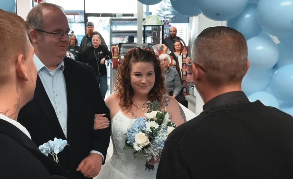 Stunned couple marries in gas station restroom next to the men's urinals 2