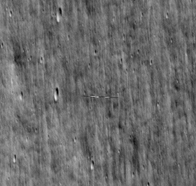 NASA's lunar orbiter captures surfboard sharpe UFO whizzing across surface moon 1