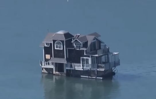 House navigated past Alcatraz Island with a tow boat's help. Image Credits: NBC Bay Area/Youtube