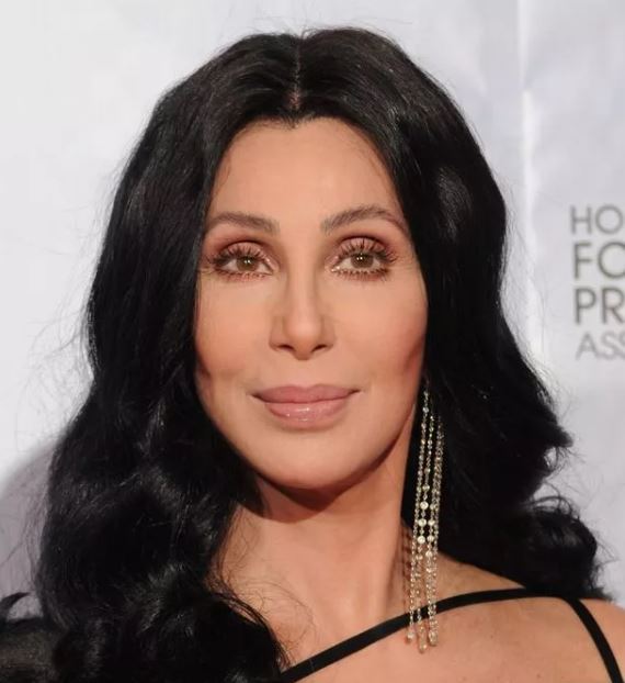 Cher's genetic makeup and lifestyle choices synergistically contribute to her ageless beauty. Image Credits: Getty