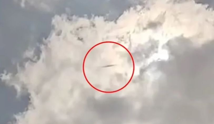 Passenger baffled after capturing 'flying cylinder' soaring over airport 9