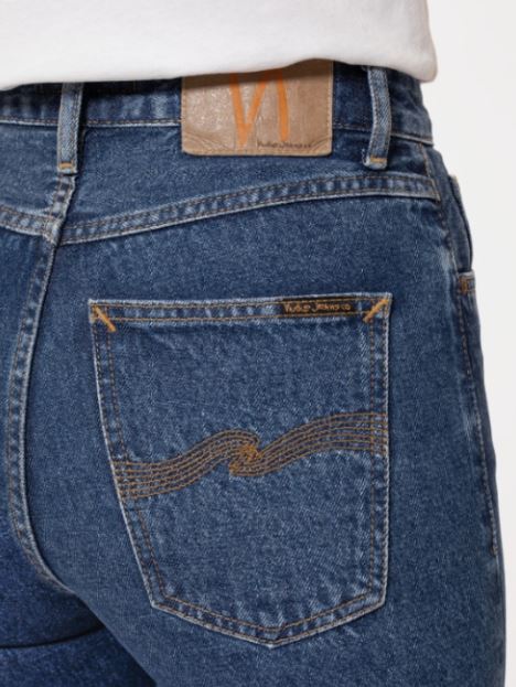 Additionally, the jacron leather patch on the back of jeans serves as a brand identifier and fashionable decoration.. Image Credits:  Getty
