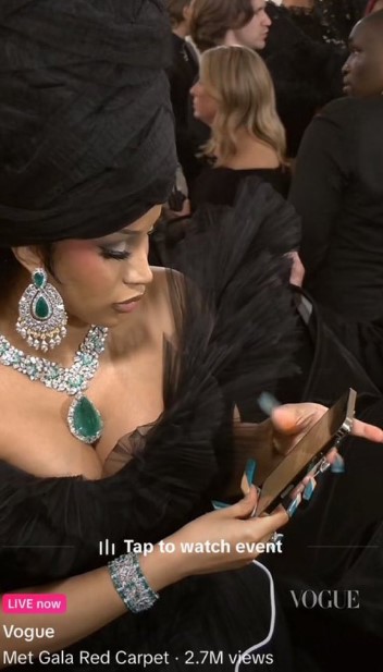 Cardi B  inadvertent reveal of her phone screen during the livestream has ignited discussions on social media. Image Credits: Vogue