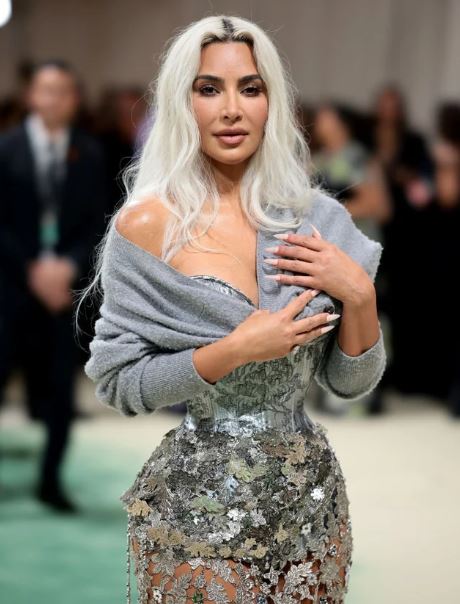 Despite difficulty breathing, Kim persevered in wearing the corset for a beautiful figure.  Image Credits: Getty