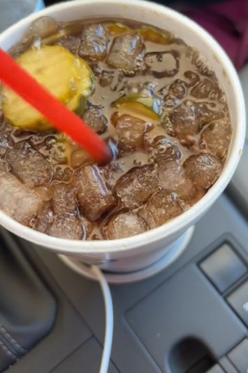 A TikToker named Mississippi Memaw documented her experience ordering and drinking the pickle-infused beverage. Image Credits: @TikTok/@mississippimemaw