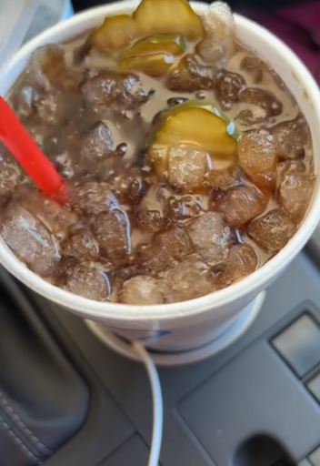 . In the video, she orders a pickle-filled Dr Pepper from her local Sonic drive-through. Image Credits: @TikTok/@mississippimemaw