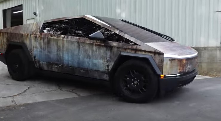 Some Cybertruck owners were stunned after first glance about Tesla Cybertruck wrapped in rust. Image Credits: WhipAddict