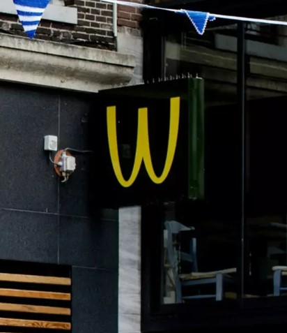 McDonald's makes a decision to flip its iconic 'golden arches' upside down to honor Women's Day. Image Credit: Getty