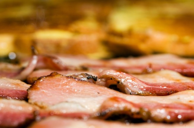 Tender Belly explained that dry curing involves rubbing pork with salt and nitrates, while wet curing uses a brine solution. Image Credits: Getty