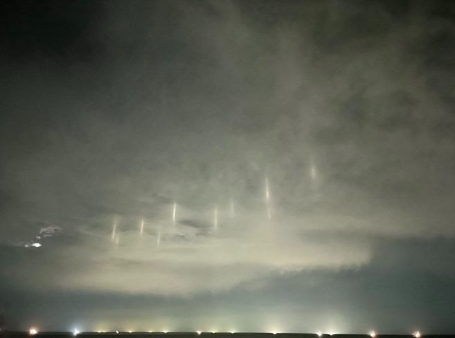 Nine pillars of light captured in the night sky spark concerns of alien abduction 3