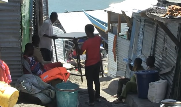 Residents of Migingo Island live in cramped metal shacks with limited personal space.  Image Credits: AFP News Agency