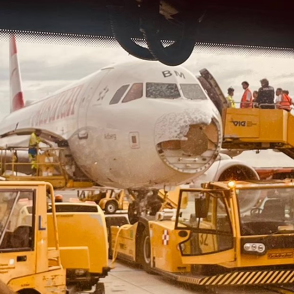 Passenger jet miraculously lands despite hailstone damage 1