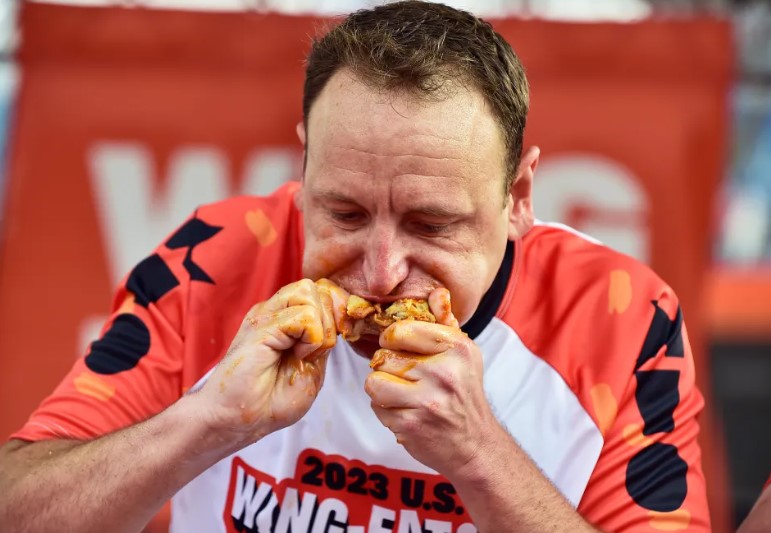 Joey Chestnut, a 16-time hot dog eating champion, banned from Nathan's contest. Image Credits: Getty