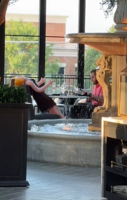 Waitress fired after sharing viral video capturing  unusual sight of man dining with a blow-up doll 4