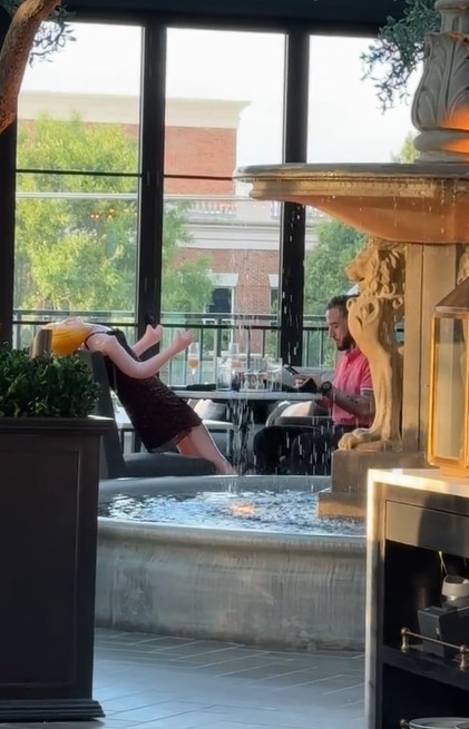 Waitress fired after sharing viral video capturing  unusual sight of man dining with a blow-up doll 5