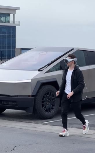Cybertruck owner goes viral for bizarre exit style with vision pros goggles 1