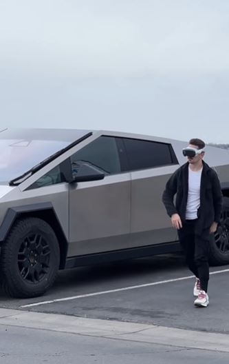 Cybertruck owner goes viral for bizarre exit style with vision pros goggles 2