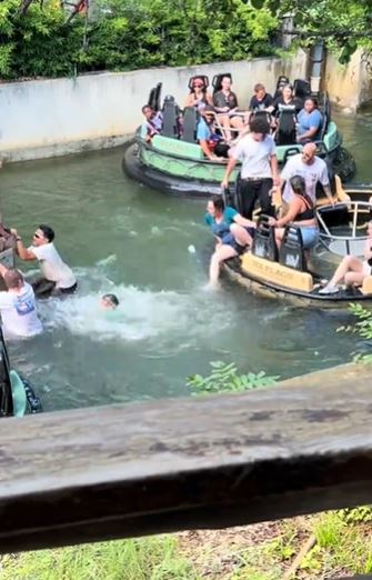 Guests forced to jump into water during malfunction at the Six Flags Roaring Rapids Ride 6