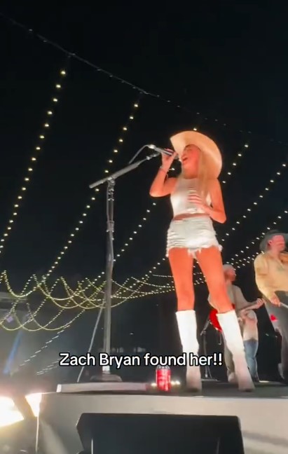 Hawk Tuah Girl's fame skyrockets after joining country music star Zach Bryan on stage in Nashville 3
